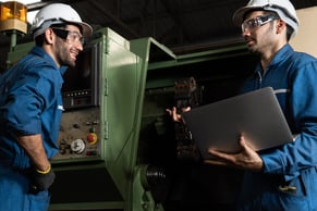 maintenance workers discussing normal idle time