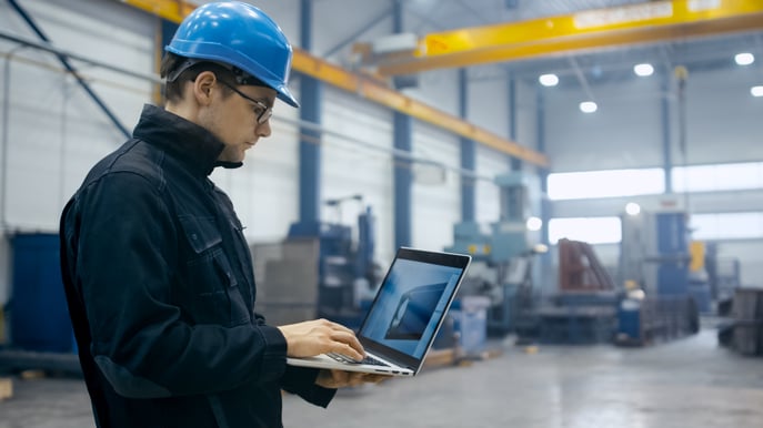 maintenance-crew-inspects-a-piece-of-equipment-in-their-facility